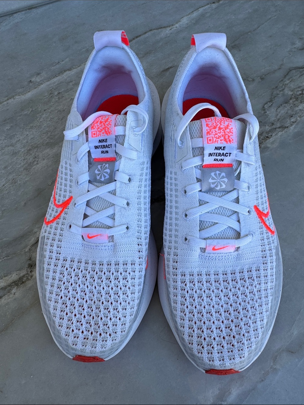 Nike Interact Run Women's White with Neon Orange Accents